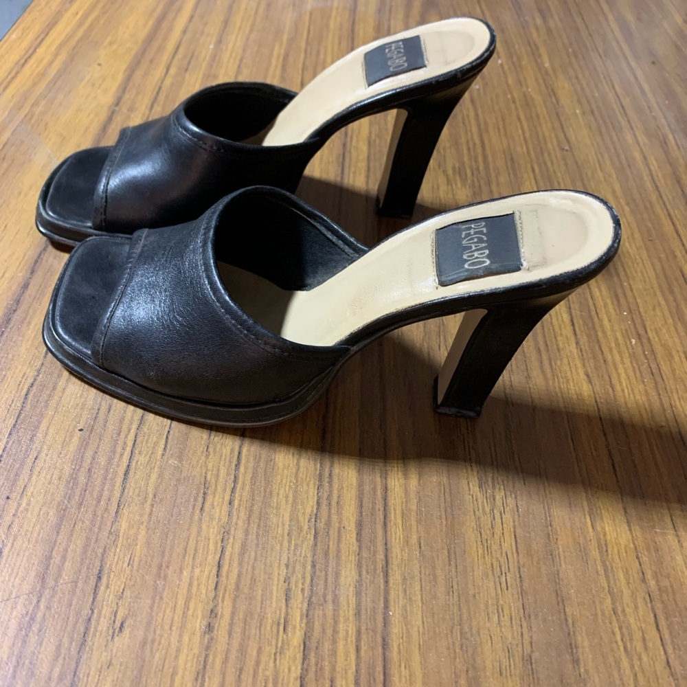 Very good condition, worn a few times black leather